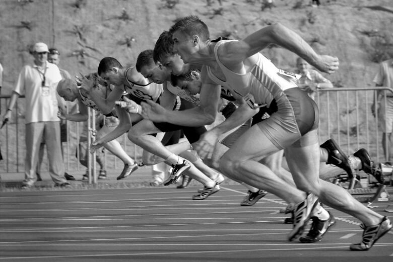 male-athletes-racing-bw